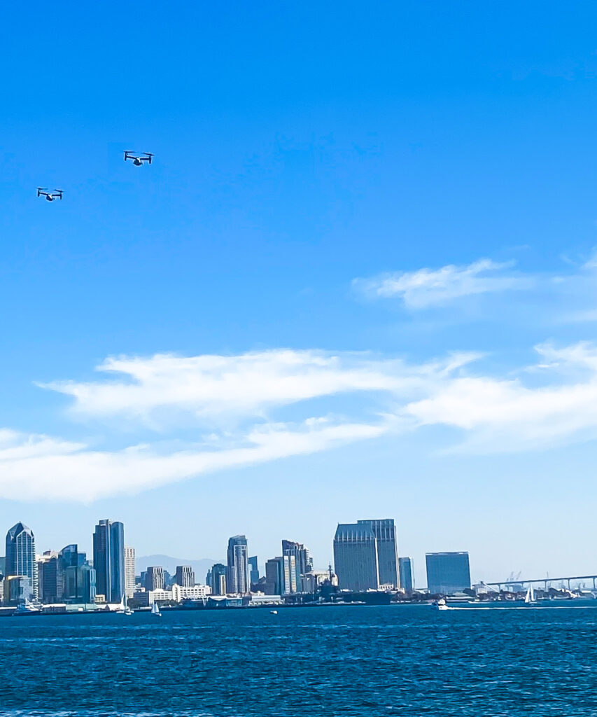 Two Osprey's (aircraft) flying over San Diego Bay