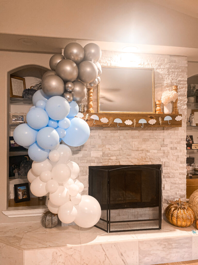 balloon arch and storm themed garland